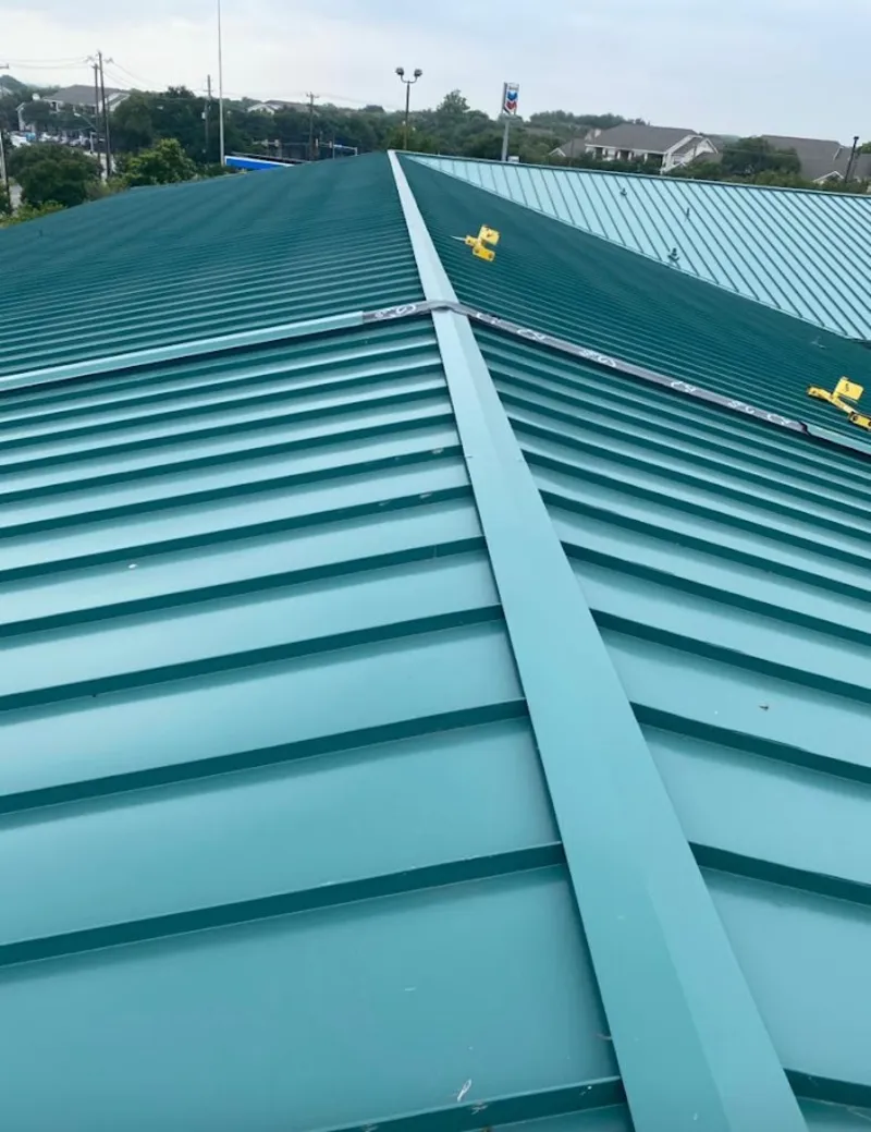 Green commercial metal roof ridge and valley for Metal Roof Repair in Snyder