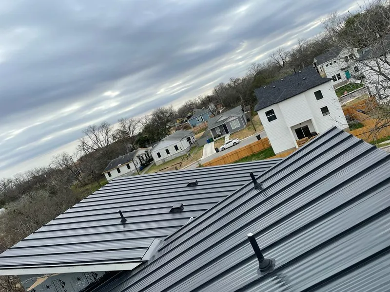 Standing seam metal roof panels with vents for Skylight Repair in Snyder
